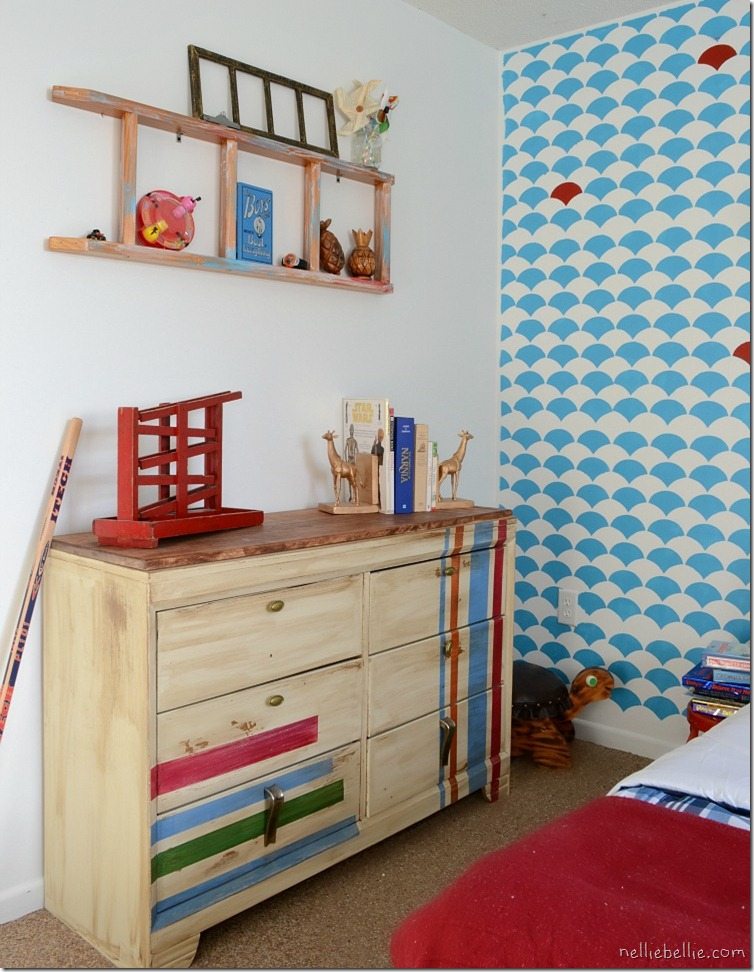 tips and tricks for decorating a boy's bedroom on a budget. This room was under $150 with some great repurposing and clever hacks!