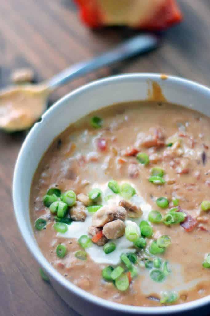 A bowl of creamy, dairy-free african peanut soup.