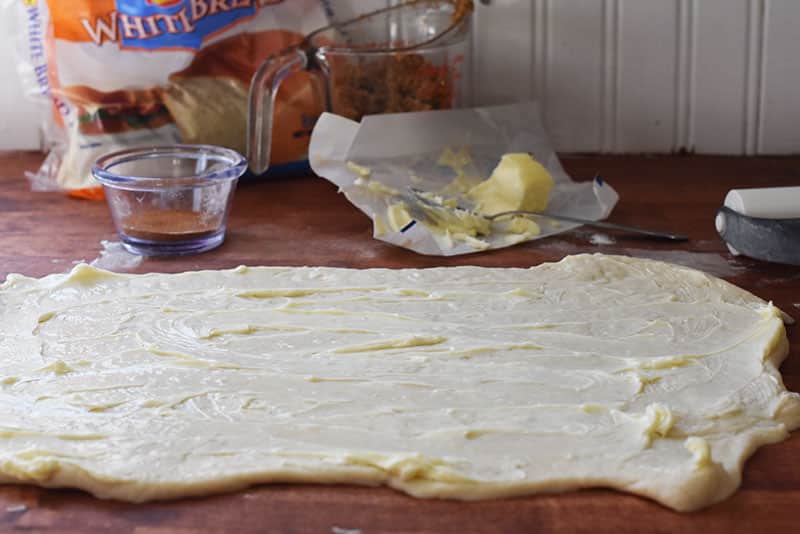 rolling out frozen dough for Cinnamon rolls