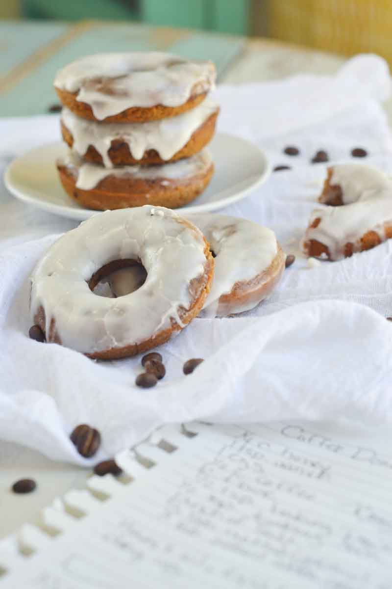 These baked coffee cake donuts are easy to make and jammed with coffee flavor and topped with a bold whiskey icing. The perfect start to your weekday breakfast!