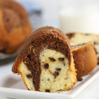 this Chocolate Chip marble bundt cake is studded with chocolate chips and utterly delicious!