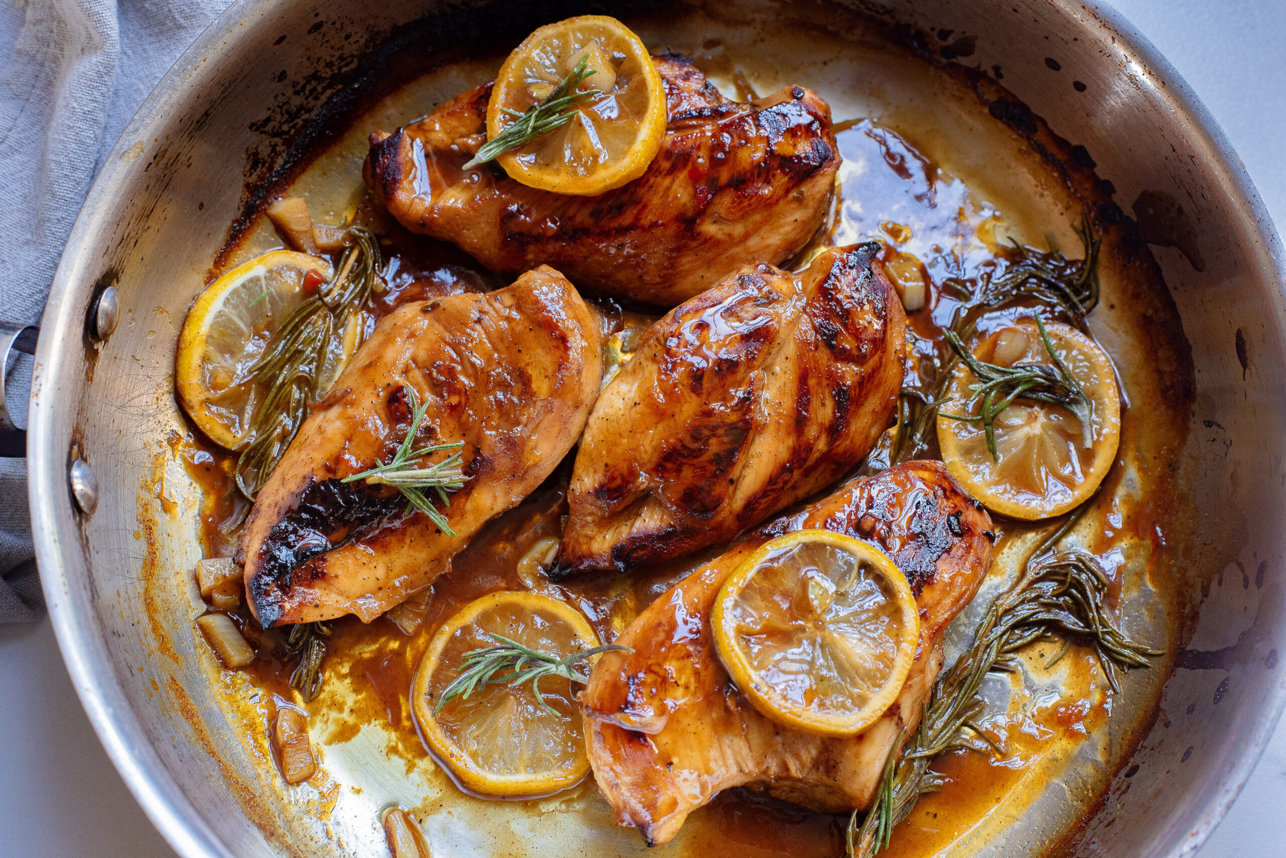 skillet of lemon rosemary chicken breasts