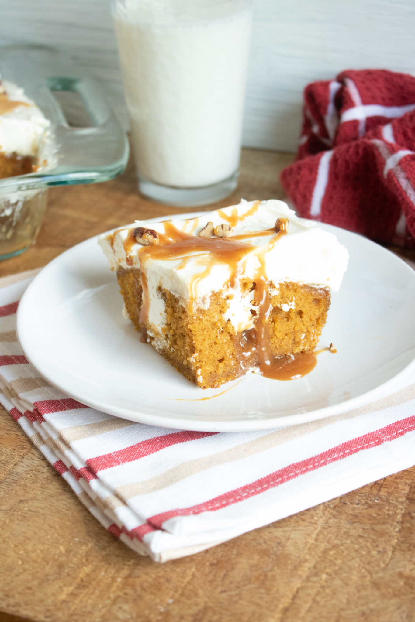 Pumpkin Poke Cake with cream cheese and caramel