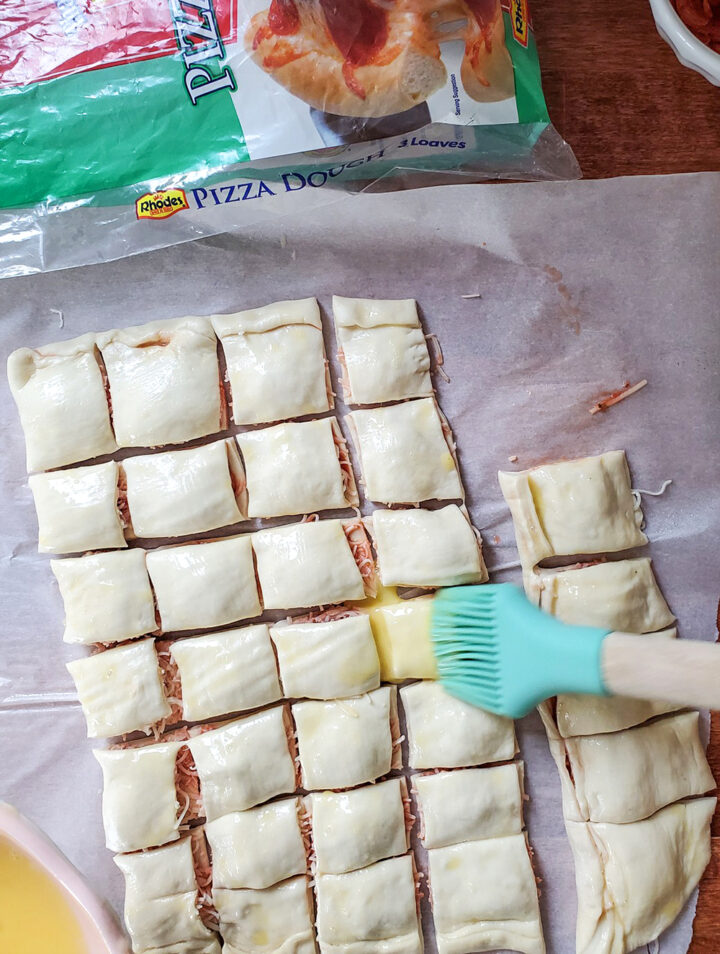 Pizza bites getting an egg wash