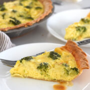 broccoli and cheese quiche on a plate